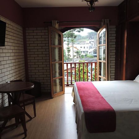 Hotel Monte Carlo Campos do Jordão Стая снимка